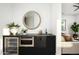 Stylish bar area includes a sink, wine fridge, microwave, and sleek countertops at 6614 E North Ln, Paradise Valley, AZ 85253