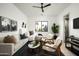 Serene bedroom boasts a sitting area, modern decor, and a bright window view at 6614 E North Ln, Paradise Valley, AZ 85253