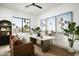 Bright office with hardwood floors, a ceiling fan, and a view of the manicured front yard at 6614 E North Ln, Paradise Valley, AZ 85253