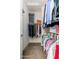 Walk-in closet with organized clothing racks and shelving for efficient storage solutions at 6621 S Balboa Dr, Gilbert, AZ 85298