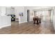 Spacious game room featuring wood-look floors, ample natural light, and an open layout at 6621 S Balboa Dr, Gilbert, AZ 85298