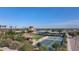 Aerial view showcasing community amenities, including tennis courts and water slides at 6623 S Classic Way, Gilbert, AZ 85298