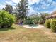 The backyard features a sparkling swimming pool with lounge chairs and a diving board at 6735 E San Juan Ave, Paradise Valley, AZ 85253