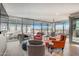 Bright living room with large windows providing stunning city views and hardwood flooring at 7120 E Kierland Blvd # 507, Scottsdale, AZ 85254