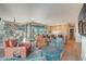 Spacious living room with hardwood floors, modern lighting, and an open concept floor plan at 7120 E Kierland Blvd # 507, Scottsdale, AZ 85254