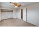 Bedroom with carpet, closet, and doorway to other parts of the home at 7624 E Plata Ave, Mesa, AZ 85212