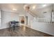 Open concept entryway that includes a dining area, staircase and views to other rooms at 7624 E Plata Ave, Mesa, AZ 85212