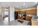 Bright kitchen featuring oak cabinets, granite countertops and black appliances at 7624 E Plata Ave, Mesa, AZ 85212