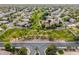 Stunning aerial view of a residential community with lush green spaces and well-maintained landscaping at 844 E County Down Dr, Chandler, AZ 85249