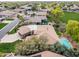 Aerial view showcasing the home's backyard pool and lush landscaping at 844 E County Down Dr, Chandler, AZ 85249