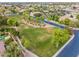 Beautiful aerial view of a community park with lush greenery and mature trees, perfect for recreation and relaxation at 844 E County Down Dr, Chandler, AZ 85249