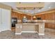 Spacious kitchen boasts ample counter space, storage, and a convenient island for meal preparation at 844 E County Down Dr, Chandler, AZ 85249