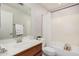 Well-maintained bathroom featuring a single sink vanity, a toilet, and a shower-tub combination, offering essential functionality at 1019 N Monterey St, Gilbert, AZ 85233