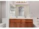 Bathroom features dual sink vanity, large mirror and cabinet storage at 1019 N Monterey St, Gilbert, AZ 85233