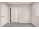 Neutral bedroom featuring plush carpet, a window and a closet at 1019 N Monterey St, Gilbert, AZ 85233