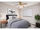 Inviting bedroom with soft lighting, a comfortable bed, and minimalist decor, creating a calming retreat at 1019 N Monterey St, Gilbert, AZ 85233