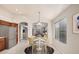 Open kitchen area with a view of the living room, complete with modern appliances and a breakfast nook at 1019 N Monterey St, Gilbert, AZ 85233