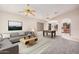 Inviting living room with neutral tones, comfortable seating, modern decor and a foosball table, ideal for relaxation and fun at 1019 N Monterey St, Gilbert, AZ 85233