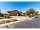 Charming single-Gathering home in a well-kept neighborhood with flowering trees and manicured lawns at 10307 E Tiburon Ave, Mesa, AZ 85212