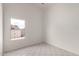 A bright room features tile floors, and a window showcasing the exterior at 10358 N 78Th Ave, Peoria, AZ 85345