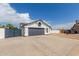 Charming single-story home with a two-car garage, gravel landscaping, and a well-maintained front yard at 10358 N 78Th Ave, Peoria, AZ 85345