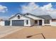 Charming single-story home with a two-car garage, gravel landscaping, and a well-maintained front yard at 10358 N 78Th Ave, Peoria, AZ 85345