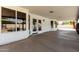 Covered patio offers a spacious area for outdoor dining and relaxation, seamlessly connecting indoor and outdoor living spaces at 10358 N 78Th Ave, Peoria, AZ 85345