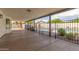 Large covered patio features a view of the pool, perfect for entertaining and enjoying the outdoor space at 10358 N 78Th Ave, Peoria, AZ 85345