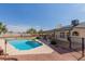A refreshing pool and covered patio offer great outdoor space, perfect for enjoying sunny days and entertaining guests at 10358 N 78Th Ave, Peoria, AZ 85345