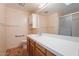 Practical bathroom with updated fixtures, single sink vanity, shower, and ample lighting at 10619 N 38Th Ave, Phoenix, AZ 85029