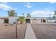 Charming home featuring archways and desert landscaping in the front yard at 10619 N 38Th Ave, Phoenix, AZ 85029