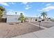 Charming home featuring archways and desert landscaping in the front yard at 10619 N 38Th Ave, Phoenix, AZ 85029