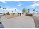 Beautiful home exterior featuring desert landscaping and a circular driveway at 10619 N 38Th Ave, Phoenix, AZ 85029