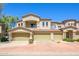 Stunning home with a three-car garage, tile roof, and lush landscaping at 11000 N 77Th Pl # 2042, Scottsdale, AZ 85260