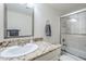 Bathroom featuring a granite countertop vanity and a glass enclosed shower with tile surround at 1216 E Rowlands Ln, Phoenix, AZ 85022
