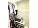 Organized closet with clothing racks, shelving, and a mirror at 1265 S Aaron -- # 299, Mesa, AZ 85209