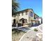 Charming townhome exterior with a private entrance, garage, and manicured common areas in a neighborhood setting at 1265 S Aaron -- # 299, Mesa, AZ 85209