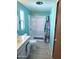 Bathroom featuring a bright vanity with storage and a walk-in shower for a clean and modern look at 127 S 75Th Pl, Mesa, AZ 85208