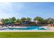 Resort-style community pool with ample seating and shade, perfect for relaxation at 12798 W Dove Wing Way, Peoria, AZ 85383