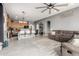 Open-concept living area with stylish furnishings, smooth floors, and plenty of room to gather and relax at 12798 W Dove Wing Way, Peoria, AZ 85383