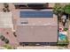 Aerial rooftop view featuring solar panels and a swimming pool at 12936 W Flower St, Avondale, AZ 85392