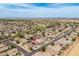 Expansive aerial view showcases the neighborhood's layout, green spaces, and convenient location near amenities at 12936 W Flower St, Avondale, AZ 85392
