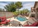Charming backyard pool with lush landscaping, creating a private and serene oasis for relaxation at 12936 W Flower St, Avondale, AZ 85392