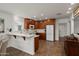 Updated kitchen features stainless steel appliances, modern countertops and ample cabinet space at 13023 W Tangelo Dr, Sun City West, AZ 85375