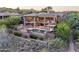 Spacious backyard with pool, spa, and lush desert landscaping, great for enjoying outdoor living at 15135 E Sundown Dr, Fountain Hills, AZ 85268