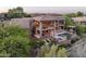 Aerial view showcasing the outdoor living space, including the pool, spa, patio, and balconies at 15135 E Sundown Dr, Fountain Hills, AZ 85268