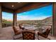 Relaxing balcony space with comfortable seating area and panoramic mountain views at 15135 E Sundown Dr, Fountain Hills, AZ 85268