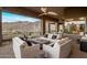 Large balcony with plentiful seating provides an inviting space with mountain views at 15135 E Sundown Dr, Fountain Hills, AZ 85268