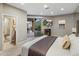 Neutral bedroom featuring a TV, outside access, and ensuite bathroom at 15135 E Sundown Dr, Fountain Hills, AZ 85268