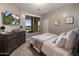 Cozy bedroom showcases soft carpet, muted walls, a TV, and stunning views at 15135 E Sundown Dr, Fountain Hills, AZ 85268